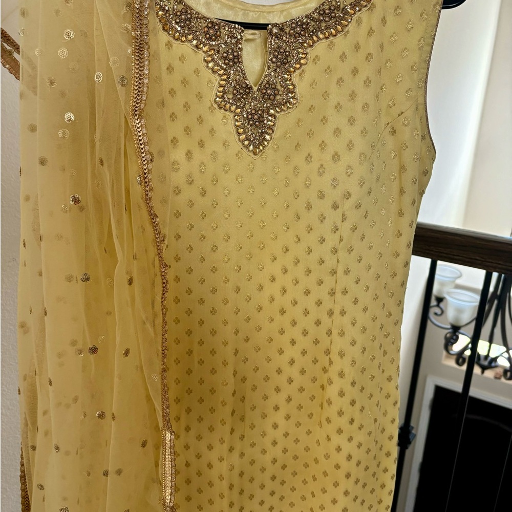 Subtle lemon and gold color shirt,  plazzo pant and net Dupatta